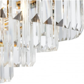 Żyrandol kryształowy glamour Revero 70cm Maytoni. Złoty, okrągły żyrandol z przezroczystymi kryształkami. Elegancki design, zawieszany na łańcuchu. Idealne oświetlenie do salonu lub jadalni. 70cm średnicy. 2